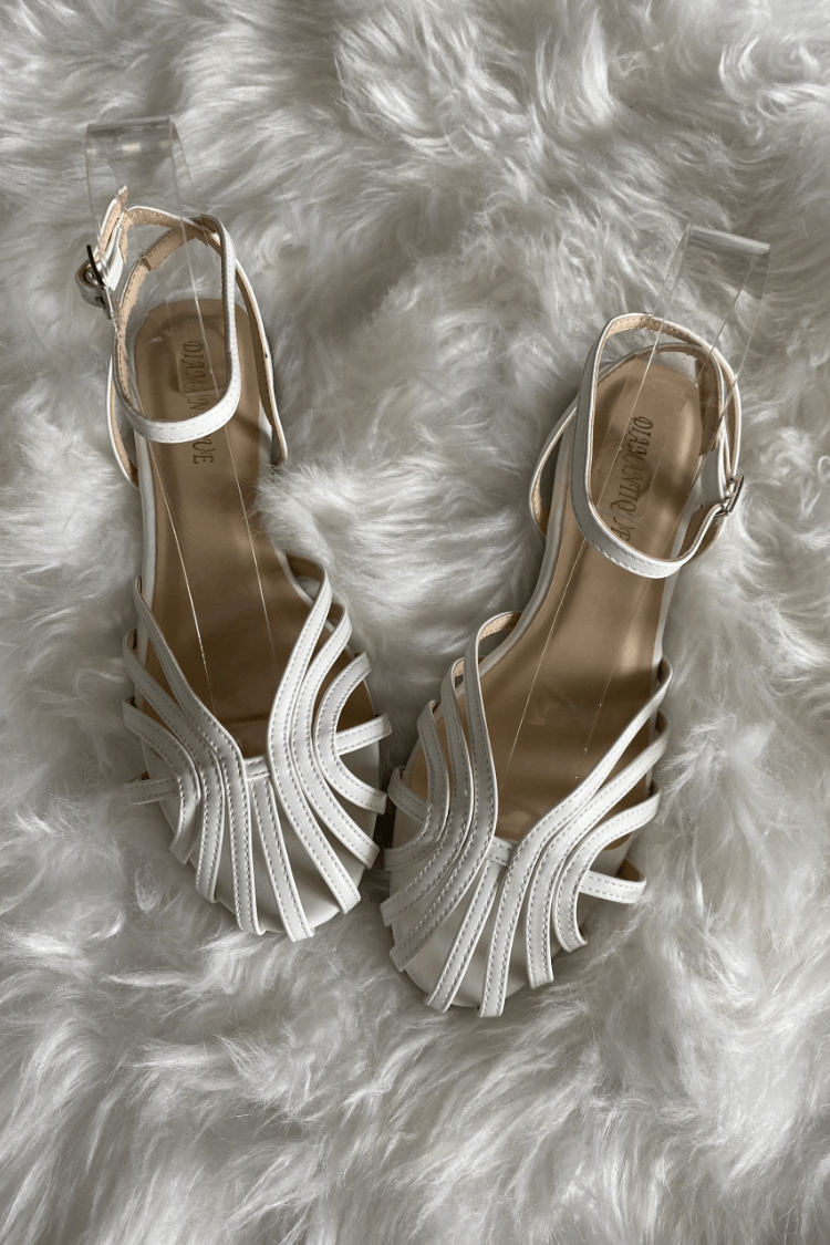 SOLE | Elegant flat woven sandals for a sophisticated look